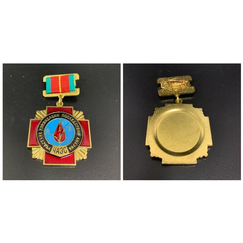 493 - SOVIET RUSSIAN CHERNOBYL LIQUIDATORS MEDAL
in gilt metal and enamel