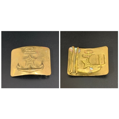 457 - SOVIET RUSSIAN NAVAL BELT BUCKLE
in brass and relief decorated with the hammer and sickle centered s... 