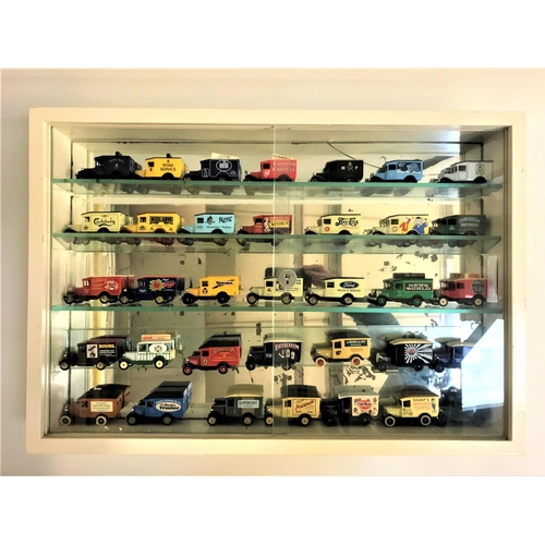 421 - COLLECTION OF DAYS GONE DIE CAST VEHICLES
all thirty five delivery vans sign written and contained i... 