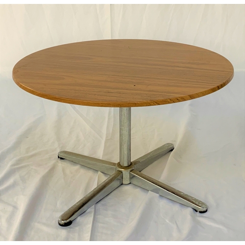 558 - FORMWOOD TEAK EFFECT OCCASIONAL TABLE
with a circular top and raised on a chrome column with four ou... 