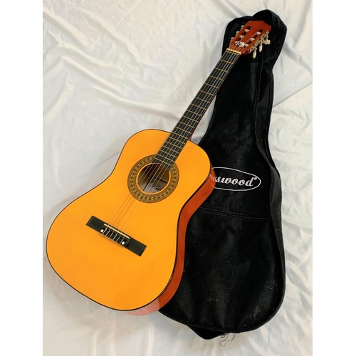 411 - HERALD ACOUSTIC GUITAR MODEL NO HL34
with six strings and strap button section, contained in a soft ... 