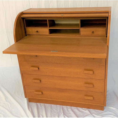 552 - TEAK CYLINDER BUREAU
with a fitted interior above four long drawers, standing on a plinth base, 90cm... 