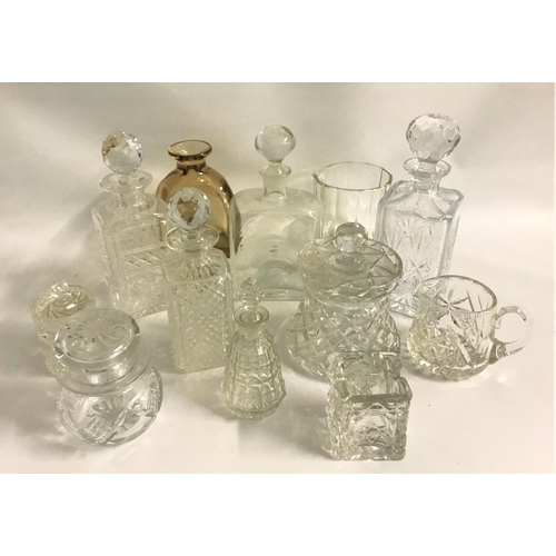 255 - SELECTION OF CRYSTAL AND OTHER DECANTERS
including an Edinburgh square spirit with stopper and four ... 