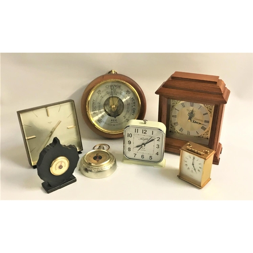 321 - SELECTION OF CLOCKS AND BAROMETERS
including a pocket watch style barometer, wooden circular baromet... 