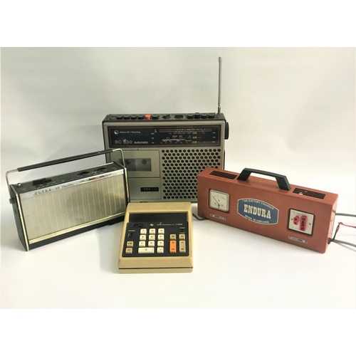 322 - A ULTRA VHF TRANSISTO WAVE RADIO
together with a Endura car battery charger, RC 630 automatic and a ... 