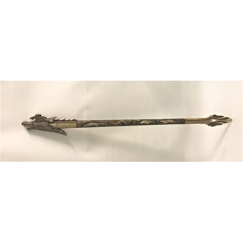 352 - SOUTH EAST ASIAN BONE BLOW PIPE
possibly Indonesian, formed in various carved sections, one end with... 