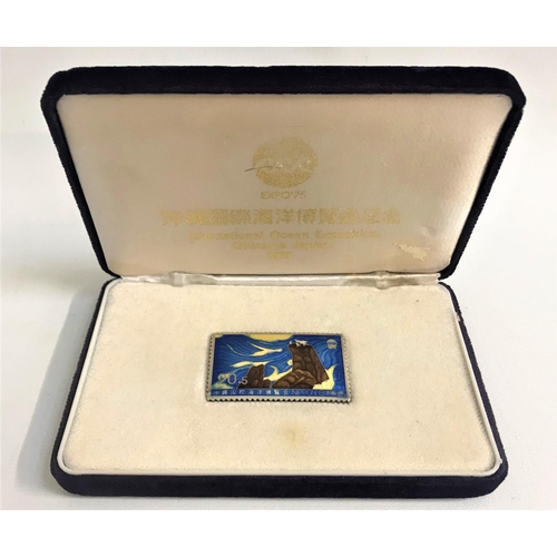 212 - ENAMEL DECORATED SILVER STAMP
produced for the International Ocean Exposition, Okinawa, Japan in 197... 