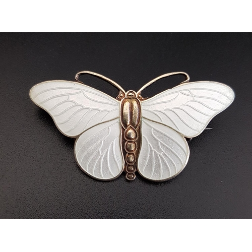 171 - NORWEGIAN ENAMEL DECORATED SILVER BUTTERFLY BROOCH
by Svein Kirkhus, in white enamel, 4.7cm wide