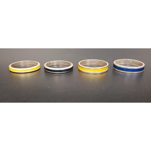 179 - THREE NORWEGIAN SILVER AND ENAMEL RINGS
a yellow and a blue band by David Andersen; and a yellow ban... 