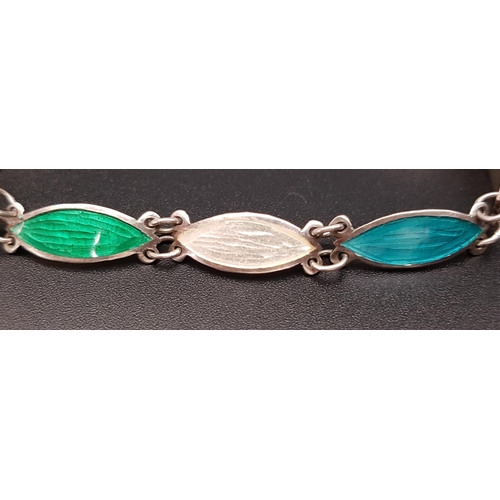 185 - ENAMEL DECORATED SILVER BRACELET
with alternating white, green and turquoise links, maker mark DPG, ... 