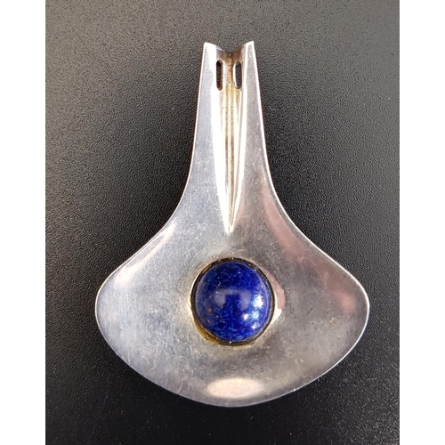 199 - AKSEL HOLMSEN NORWEGIAN SILVER PENDANT
set with a round cabochon lapis lazuli to the centre of the s... 