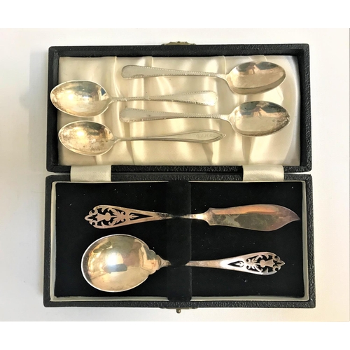 217 - CASED SILVER KNIFE AND SPOON
both with pieced handles, Sheffield 1958; together with a set of three ... 