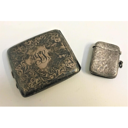 218 - GEORGE V SILVER CIGARETTE CASE
with engraved scroll decoration, Birmingham 1918; together with a Vic... 