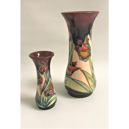 265 - MOORCROFT RED TULIP VASE
of waisted form, 21cm high, and companion, 12.5cm high (2)