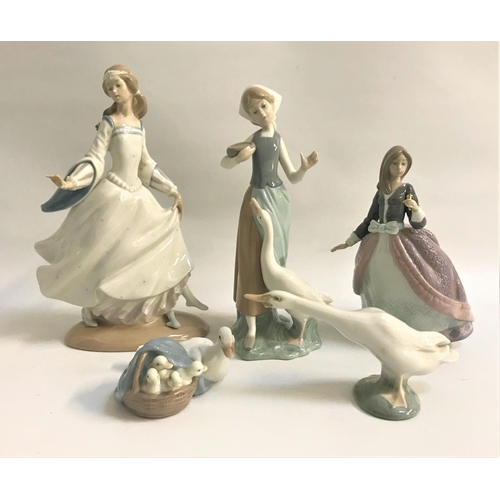 278 - FIVE LLADRO FIGURINES
comprising Cinderella, 25cm high, girl feeding a goose, 23.5cm high, girl in a... 