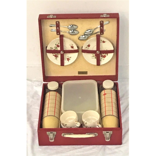 370 - BREXTON PICNIC HAMPER 
fitted for four with cups and saucers, tea spoons, two thermos flasks and foo... 