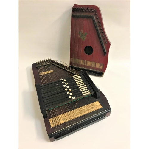 417 - SCALA AUTOHARP 
in a stained pine case, 52cm long, together with a similar Autoharp in a stained cas... 