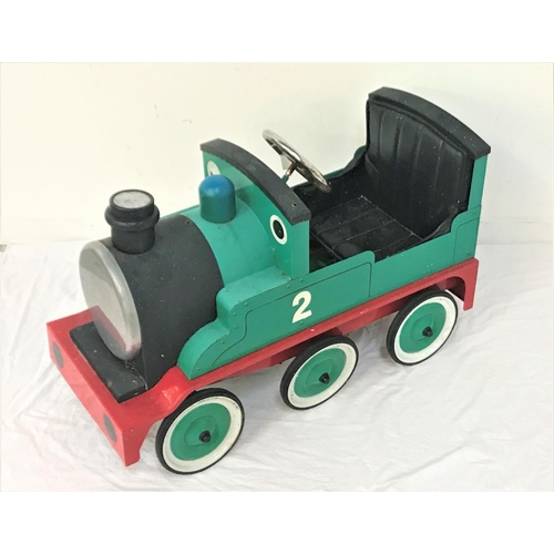 445 - VINTAGE HENRY THOMAS THE TANK ENGINE PEDAL CAR
the metal ride on car with padded seat, six wheels co... 