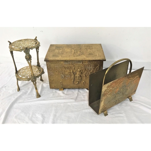 338 - BRASS EMBOSSED LOG BIN
with side carrying handles, a two tier trivet with pierced decoration and a t... 