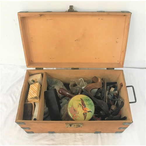 340 - SMALL WOODEN TRUNK
with metal banding, the lift up lid revealing a selection of tools, including a h... 