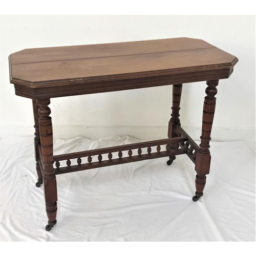 539 - EDWARDIAN MAHOGANY WINDOW TABLE
the oblong top with canted corners, standing on turned supports with... 