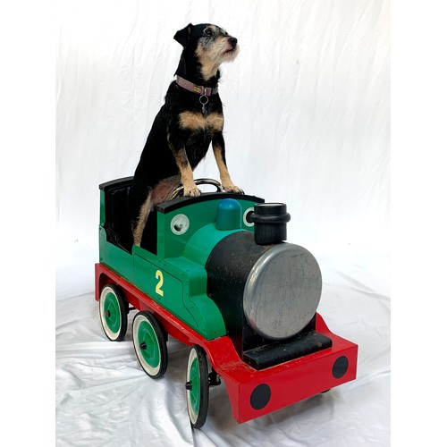 445 - VINTAGE HENRY THOMAS THE TANK ENGINE PEDAL CAR
the metal ride on car with padded seat, six wheels co... 