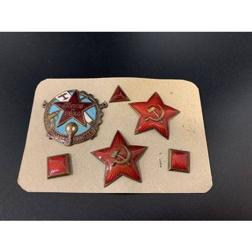 484 - SELECTION OF SOVIET RUSSIAN ENAMEL BADGES
including two Red Star cap badges with the hammer and sick... 