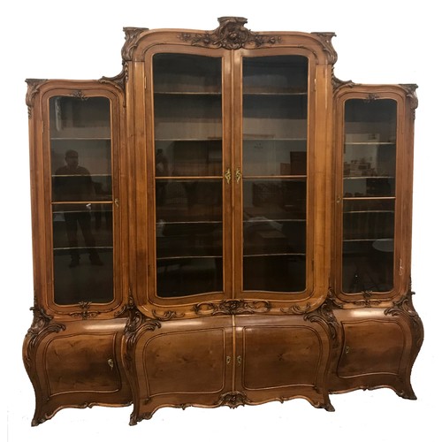 660 - LOUIS XV STYLE FRENCH WALNUT LIBRARY BOOKCASE
circa 1900, carved overall with flowers and scrolls, t... 