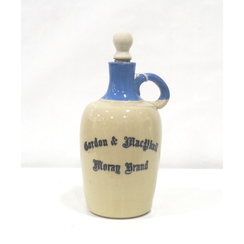 700 - GORDON & MACPHAIL MORAY BRAND DECANTER
An empty earthenware decanter from 1970's in Blue and Cream w... 