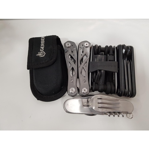 209 - GERBER MULTI TOOL
in case; together with two bike tools and folding cutlery camping tool
Note: You m... 