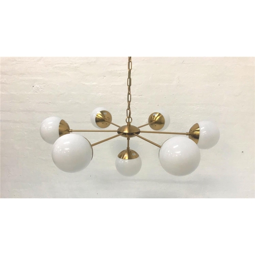 404 - SIX BRANCH PENDANT LIGHT
with opaque circular glass shades and brass effect suspension chain, and wi... 