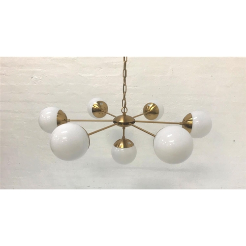 405 - SIX BRANCH PENDANT LIGHT
with opaque circular glass shades and brass effect suspension chain, and wi... 