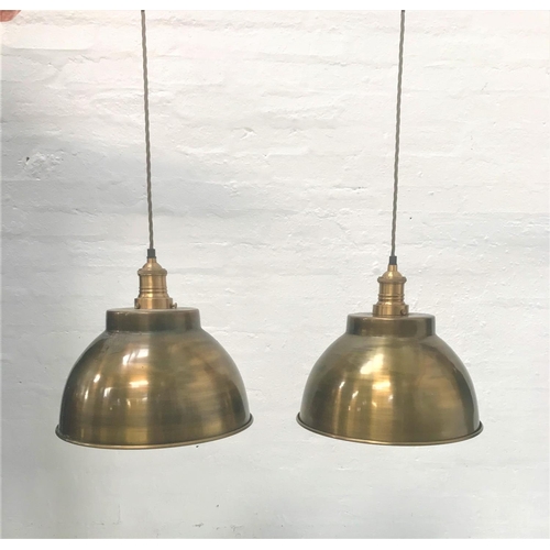 409 - PAIR OF ANTIQUE BRASS EFFECT INDUSTRIAL PENDANT LIGHTS
with domed shades and interior textured featu... 