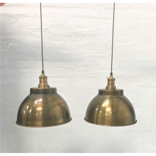 410 - PAIR OF ANTIQUE BRASS EFFECT INDUSTRIAL PENDANT LIGHTS
with domed shades and interior textured featu... 