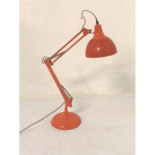 416 - ORANGE ANGLE POISE LAMP
raised on a circular base