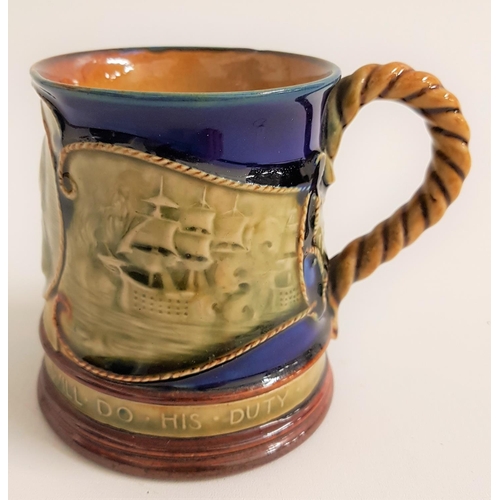 164 - ROYAL DOULTON COMMERATIVE MUG
Nelson, with relief decoration and a rope twist handle, 9.5cm high