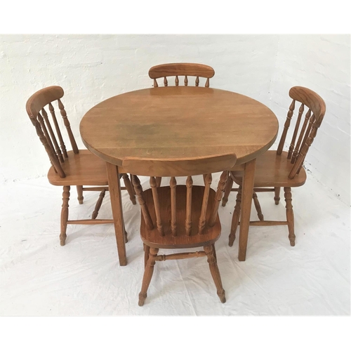 381 - CIRCULAR LIGHT OAK KITCHEN TABLE
with a broad frieze, standing on tapering supports, 105cm diameter,... 