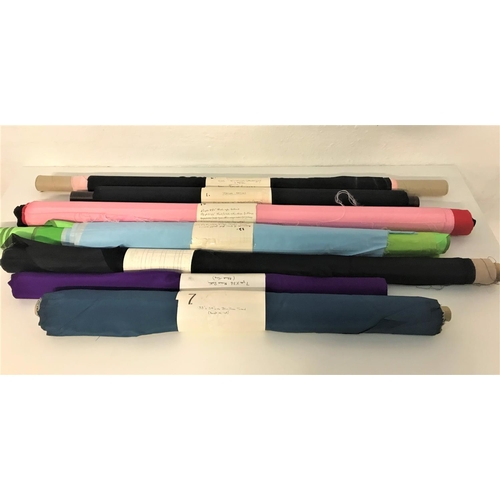 314 - SEVEN ROLLS OF VARIOUS FABRIC
including purple, pink, and black satin, teal coloured taffeta, black ... 