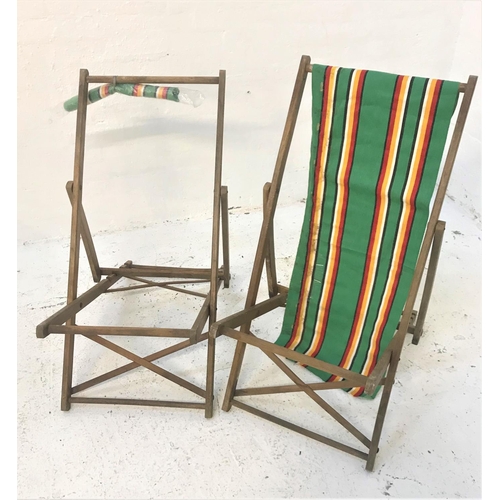 394 - PAIR OF VINTAGE FOLDING DECK CHAIRS
one with the original striped material (2)