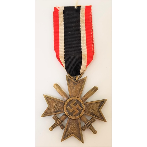 354 - NAZI WAR MERIT CROSS MEDAL
with swords and ribbon