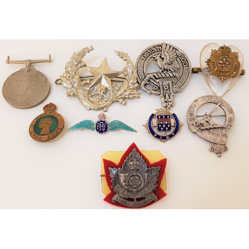 349 - SELECTION OF SCOTTISH CLAN AND MILITARY BADGES
from Clan MacMillan, Munro clan, The North Saskatchew... 