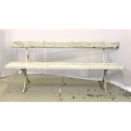 382 - EARLY 20TH CENTURY PAINTED GARDEN BENCH
with a slat back and seat on shaped iron supports, 183cm lon... 