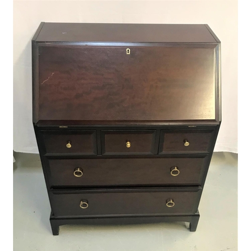 384 - STAG MAHOGANY BUREAU
with an inset fall flap and fitted interior, above three frieze drawers and two... 