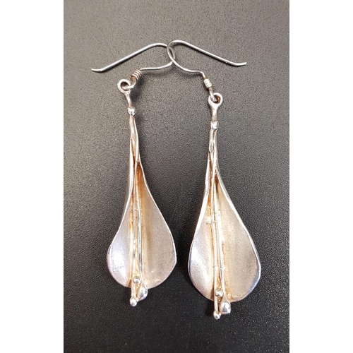 63 - ATTRACTIVE PAIR OF SILVER DROP EARRINGS
in the form of teardrop shaped flowers with long central sta... 