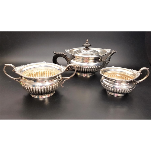 141 - VICTORIAN THREE PIECE SILVER TEA SERVICE
comprising tea pot, two handled sugar basin and milk jug, a... 