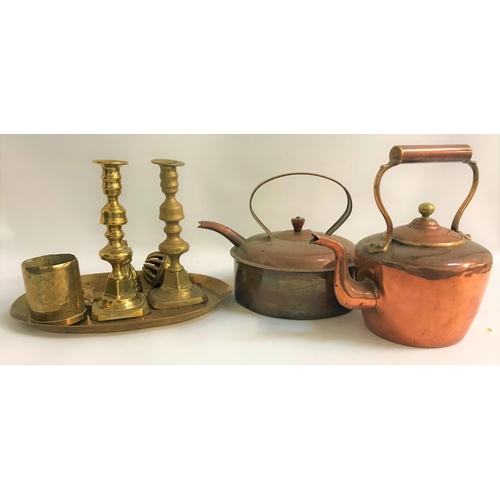 301 - SELECTION OF BRASS AND COPPER WARE
including two copper range kettles, brass trivet, oval three bran... 