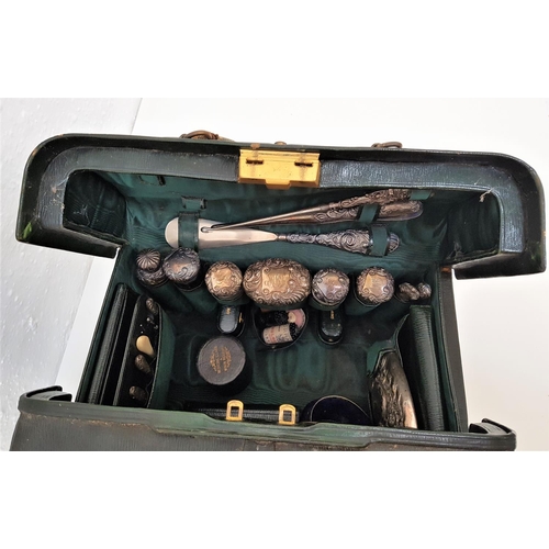 153 - IMPRESSIVE EDWARDIAN TRAVELLING GREEN LEATHER VANITY CASE
of Gladstone type, by Goldsmiths & Silvers... 