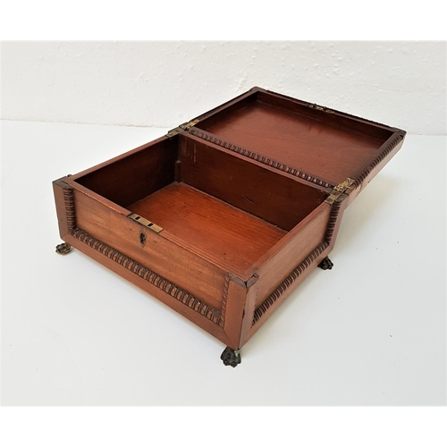 286 - CONTINENTAL WALNUT BOX
with an inlaid lift up lid above four panelled sides, standing on metal lion ... 