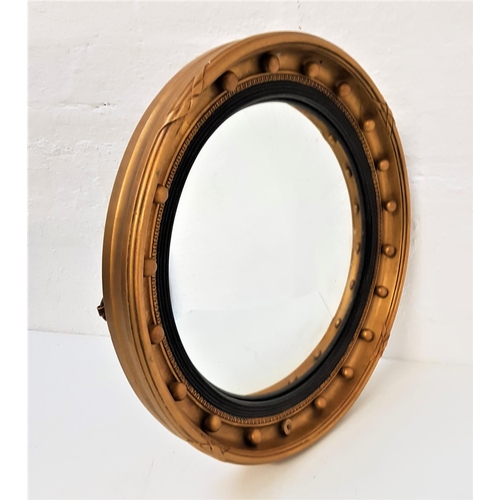 776 - CIRCULAR GILTWOOD CONVEX WALL MIRROR
with applied ball decoration, 53cm diameter