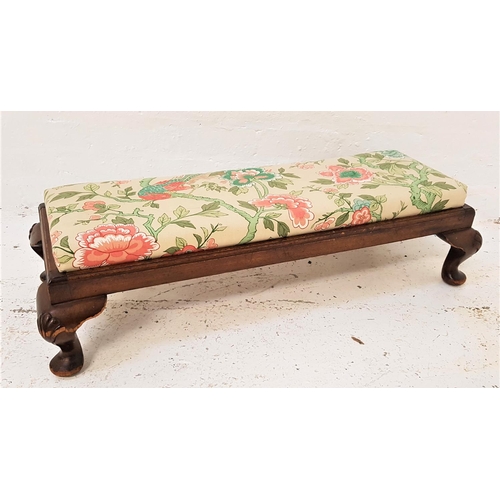 775 - MAHOGANY FRAMED FOOT STOOL
with a floral covered stuffover top, standing on stout cabriole supports,... 